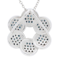 Blue diamond sterling silver pendant with accent, featuring a unique floral design and shimmering gemstones.