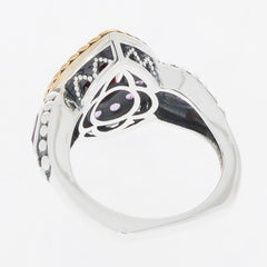 Elegant Pear Red Garnet sterling silver ring with Amethyst accents, showcasing intricate design and luxurious details.