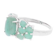 Oval green emerald sterling silver ring with accent stones, elegant and luxurious gem jewelry.
