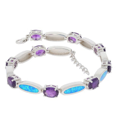 Purple amethyst sterling silver bracelet with opal accent, featuring elegant gemstones in a stylish design.