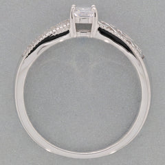 Cushion cut moissanite sterling silver ring showcasing a sleek design and sparkling accent stones.