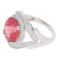 Round pink sapphire sterling silver ring with accent diamonds, showcasing elegance and luxury.