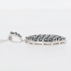 Elegant blue diamond sterling silver pendant showcasing sparkling gemstones on a delicate chain.