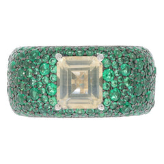 Yellow Moissanite Sterling Silver Ring with Emerald Accent, showcasing elegant design and brilliant gemstone details.
