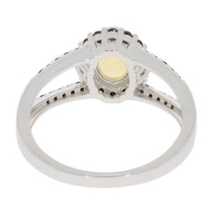 Elegant Oval White Opal Sterling Silver Ring with Diamond Accent from the back view.