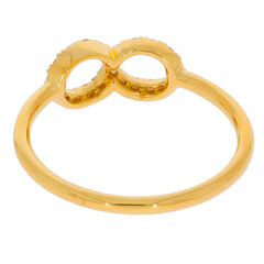 Gold infinity ring design featuring intertwined loops for a stylish and elegant look.