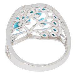 Elegant round turquoise sterling silver ring showcasing intricate design and blue gemstone accents.