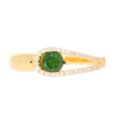 Round green Moissanite sterling silver ring with accent stones, showcasing elegance and luxury.