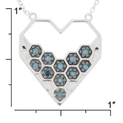 Blue diamond heart pendant necklace in sterling silver, featuring hexagonal designs and sparkling gemstones.