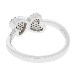 Sterling silver ring with heart-shaped accents, showcasing a sleek and polished design.
