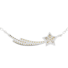 Sterling silver necklace featuring a comet design with a star and gold accents, perfect for elegant occasions.
