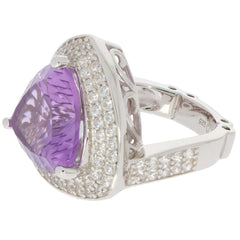 Trillion purple amethyst sterling silver ring with sparkling accents, showcasing luxury and elegance.