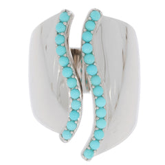 Blue turquoise sterling silver ring with elegant wave design and sparkling gemstone accents.