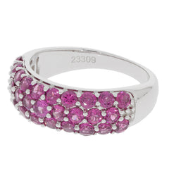 Elegant pink sapphire sterling silver ring with sparkling gemstone accents, perfect for sophisticated jewelry collections.