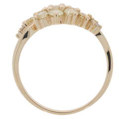 Elegant Round Green Peridot ring in 14K yellow gold with sparkling accents, showcasing timeless beauty and sophistication.