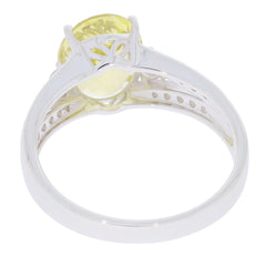 Back view of an oval yellow heliodor sterling silver ring showcasing intricate design and sparkling gemstone.