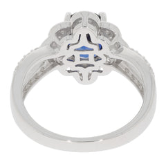 Back view of a blue sapphire sterling silver ring showcasing intricate design and gemstone accent.