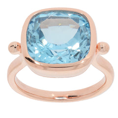 Blue topaz sterling silver ring with a brilliant gemstone, perfect for elegant styling and luxury collections.