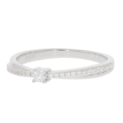 Elegant white diamond sterling silver ring with accent stones, showcasing timeless beauty and luxury.