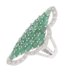 Elegant marquise green emerald sterling silver ring with accent stones for sophisticated style.