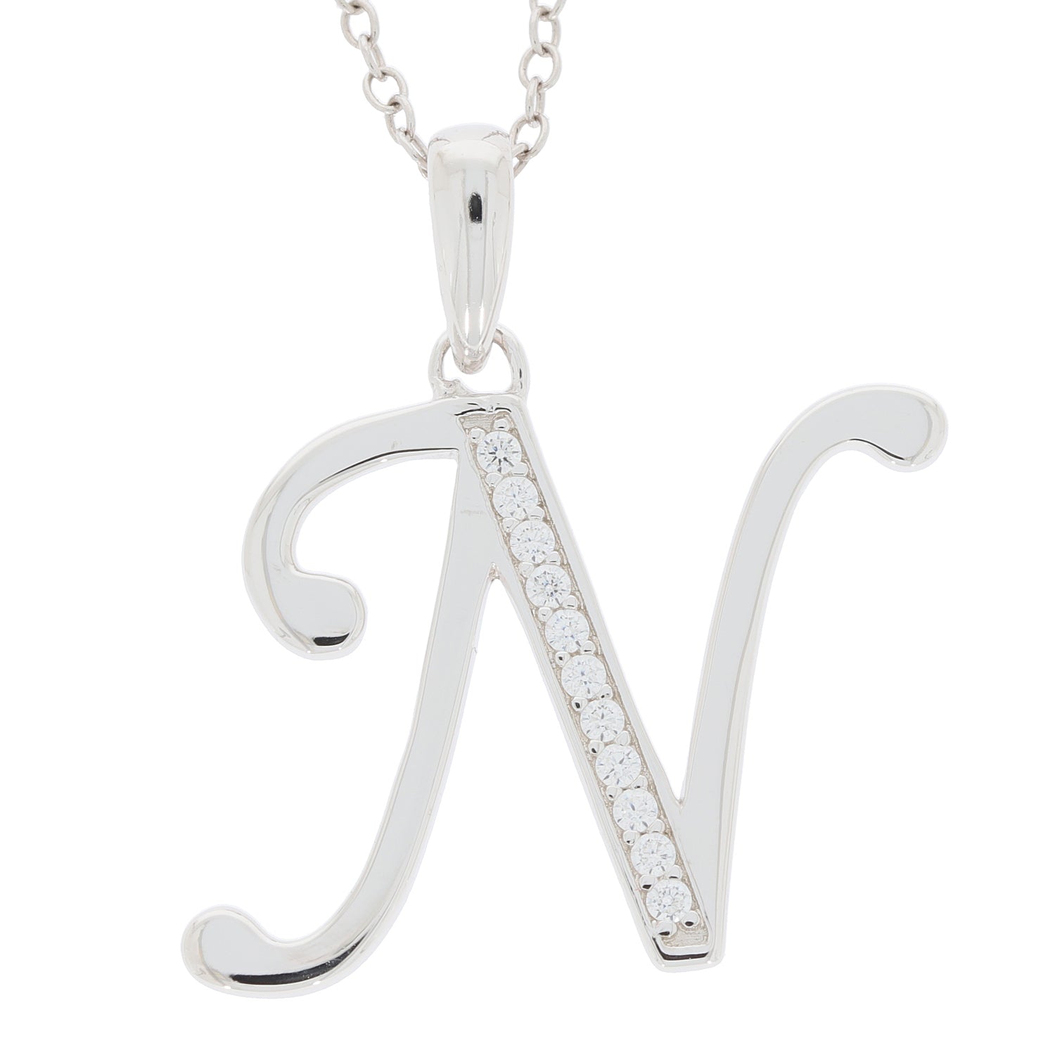 Elegant sterling silver initial 'N' pendant with sparkling gemstones on a delicate chain.