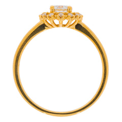 Elegant Round White Diamond ring in 14K yellow gold with diamond accents, showcasing timeless luxury and style.