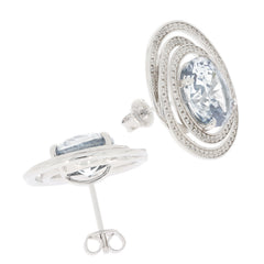 Blue Topaz sterling silver earrings with Moissanite accent, featuring an elegant oval cut gemstone design.