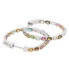 Elegant sterling silver hoop earrings adorned with colorful gemstones in shades of green, pink, and yellow.