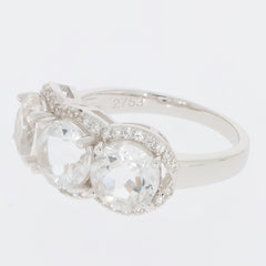 Elegant round white Moissanite sterling silver ring with sparkling accents, perfect for adding sophistication to any outfit.