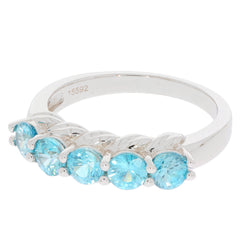 Elegant blue Moissanite sterling silver ring with five sparkling gemstones, perfect for any sophisticated jewelry collection.