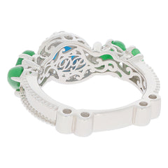 Elegant blue turquoise sterling silver ring with intricate design and green accents, perfect for any jewelry collection.