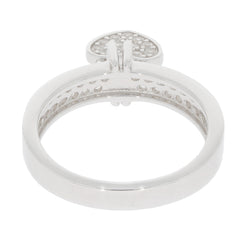 Elegant sterling silver ring featuring a heart-shaped Moissanite accent, showcasing intricate design details.