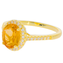 Yellow Citrine sterling silver ring with accent stones, showcasing a stunning oval cut gemstone.