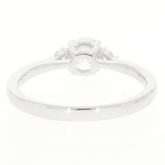 Elegant White Moissanite Sterling Silver Ring showcasing sparkling gem accents from behind.