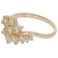 14K yellow gold ring featuring round yellow gemstones, designed for elegance and luxury in jewelry collections.