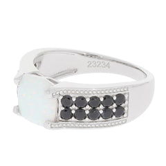 Cushion white opal sterling silver ring with black diamond accents, featuring a stunning opal centerpiece.