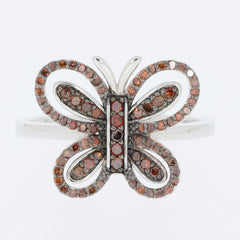 Elegant butterfly ring in sterling silver adorned with sparkling red gemstones, perfect for adding a touch of luxury.