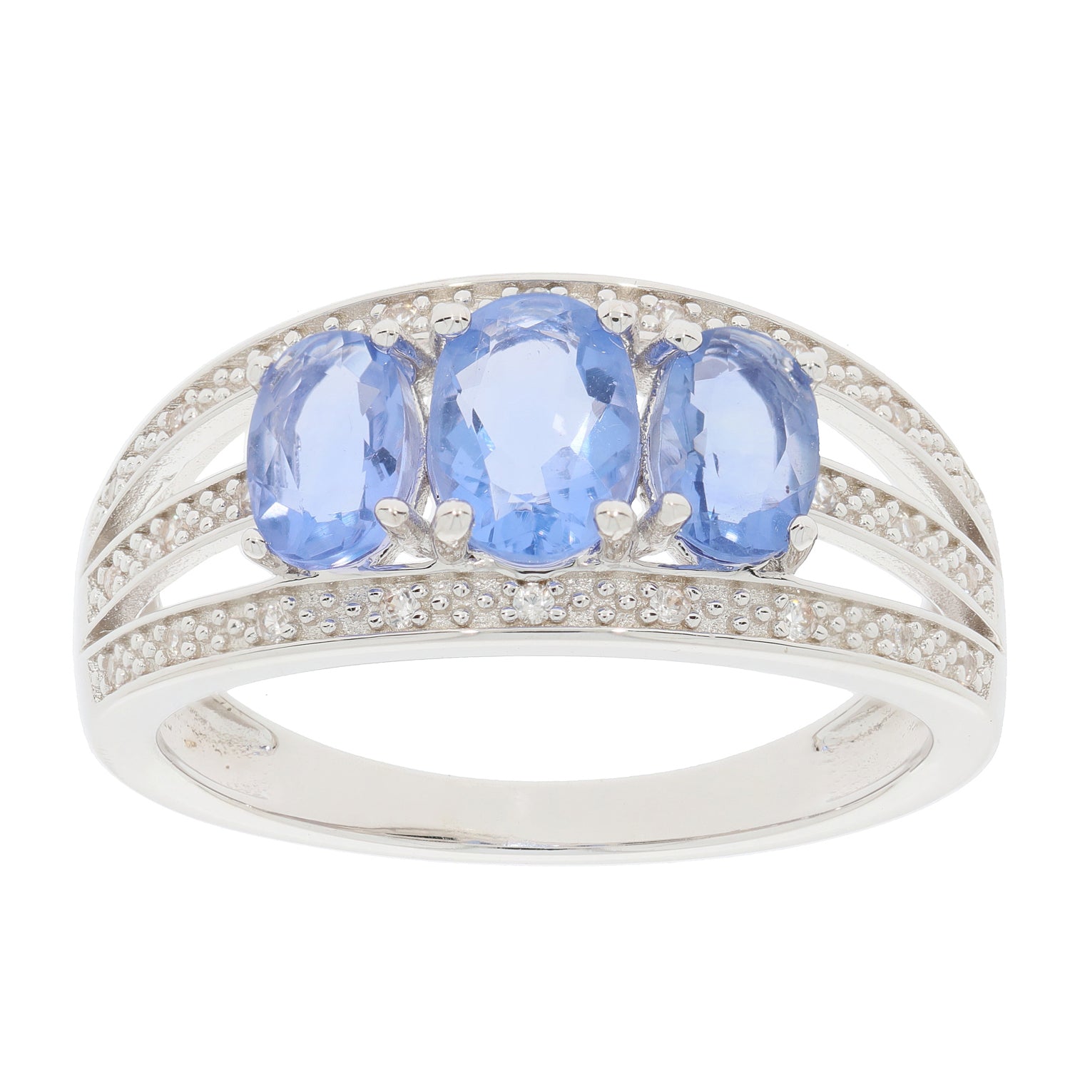 Blue Tanzanite Sterling Silver Ring featuring three oval gemstones and intricate band design.