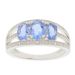 Blue Tanzanite Sterling Silver Ring featuring three oval gemstones and intricate band design.