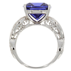 Blue sapphire sterling silver ring with intricate design, showcasing a stunning gemstone centerpiece.
