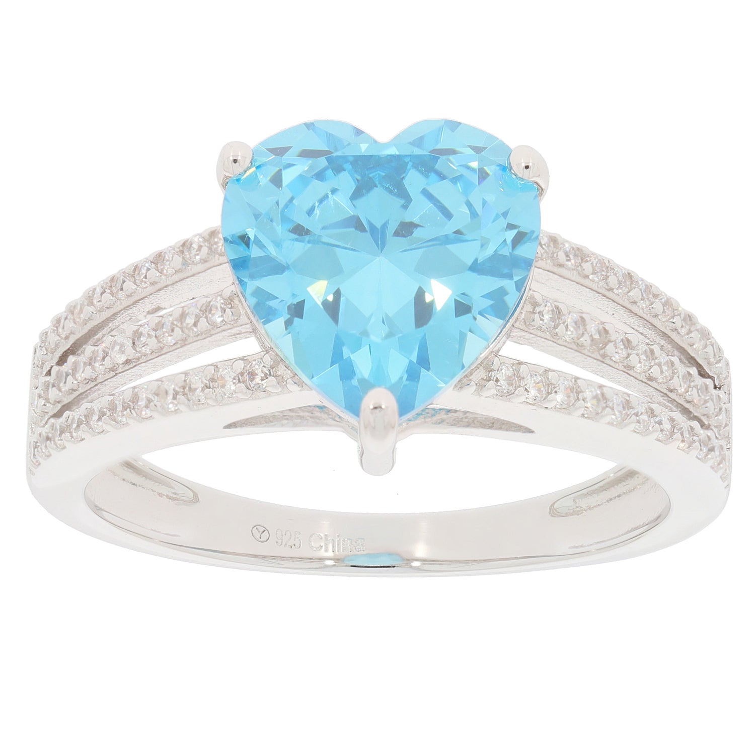 Heart-shaped blue topaz sterling silver ring with accent stones, showcasing elegance and luxury.