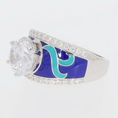 White Moissanite Sterling Silver Ring with turquoise accents and sparkling gems, perfect for elegant style.