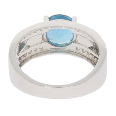 Elegant Blue Topaz Sterling Silver Ring featuring a sparkling gemstone and polished band from a rear view.