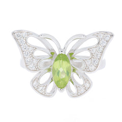 Elegant butterfly ring featuring a green Peridot gemstone and sparkling diamond accents in sterling silver.