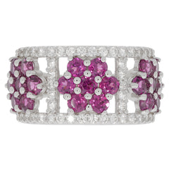 Round purple sapphire sterling silver ring with floral design and sparkling accents for a luxurious look.