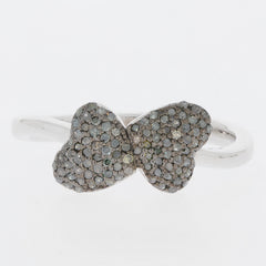 Elegant silver ring featuring a butterfly design adorned with sparkling gemstones for a stunning accessory.