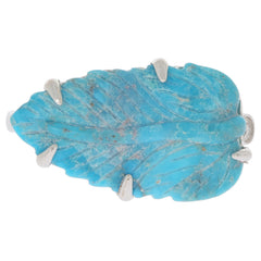 Elegant turquoise leaf ring with silver accents, showcasing a vibrant blue gemstone design.