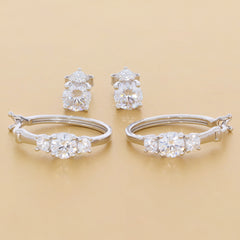 Elegant White Moissanite Sterling Silver Earrings set with accent stones, featuring sparkling brilliance and timeless design.