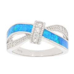 Round blue opal sterling silver ring with accent gemstones, showcasing elegance and luxury.
