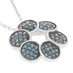 Blue diamond pendant in sterling silver with shimmering accents, perfect for elegant occasions.